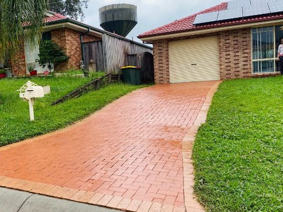 Driveway after professional pressure washing in Sydney