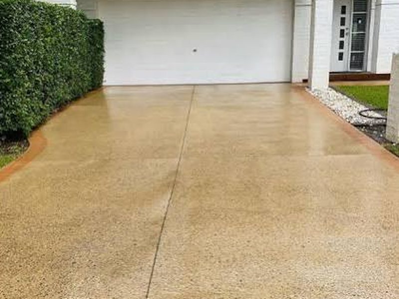Clean concrete driveway in Sydney after pressure washing
